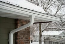 Cleaning Your Gutters In Extreme Weather: Tips for Rain, Leaves, and Frost Gutters